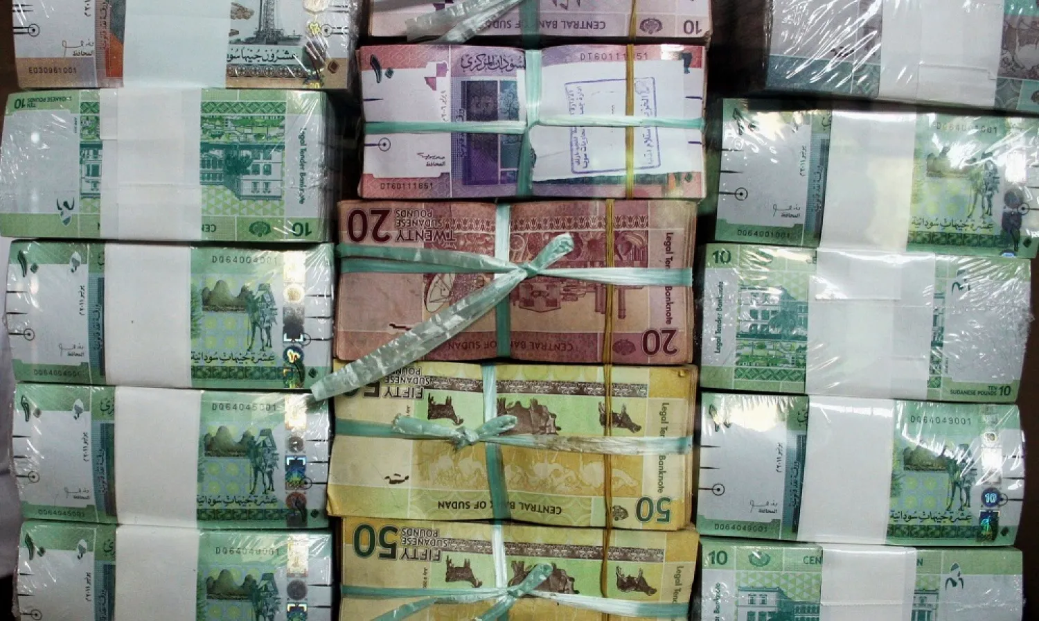In this July 24, 2011, file photo, Sudan's new currency sits behind a window at the central bank in Khartoum, Sudan. (AP)