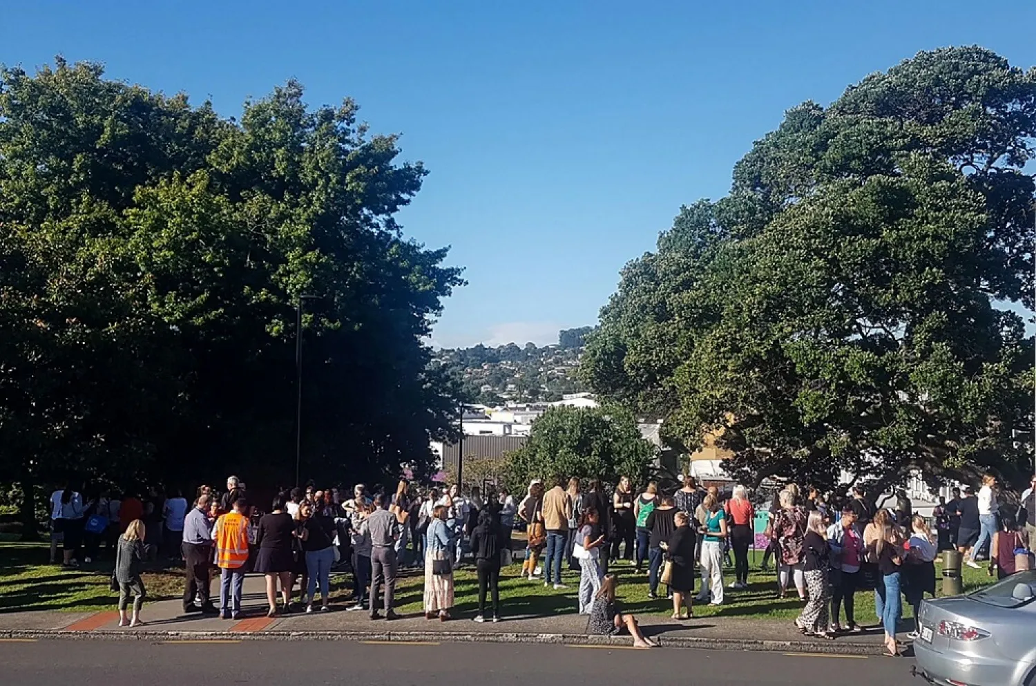 People gather on high ground in Whangarei, New Zealand, as a tsunami warning is issued Friday, March 5, 2021. (AP)