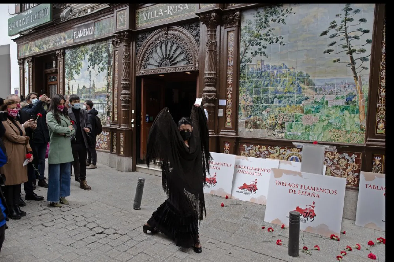 Spanish Flamenco dancer Anabel Moreno dances outside the Villa Rosa Tablao flamenco venue during a protest in Madrid, Spain, Thursday March 4, 2021. (AP)