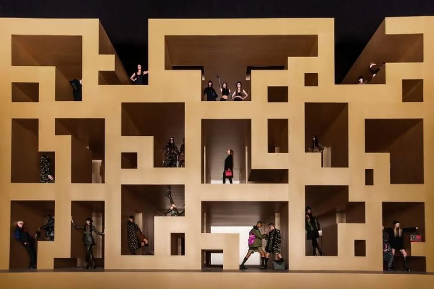 Models present creations from the Versace Fall/Winter 2021/2022 collection at the Milan Fashion Week, in Milan, Italy, in this picture released on March 5, 2021. (Handout via Reuters)