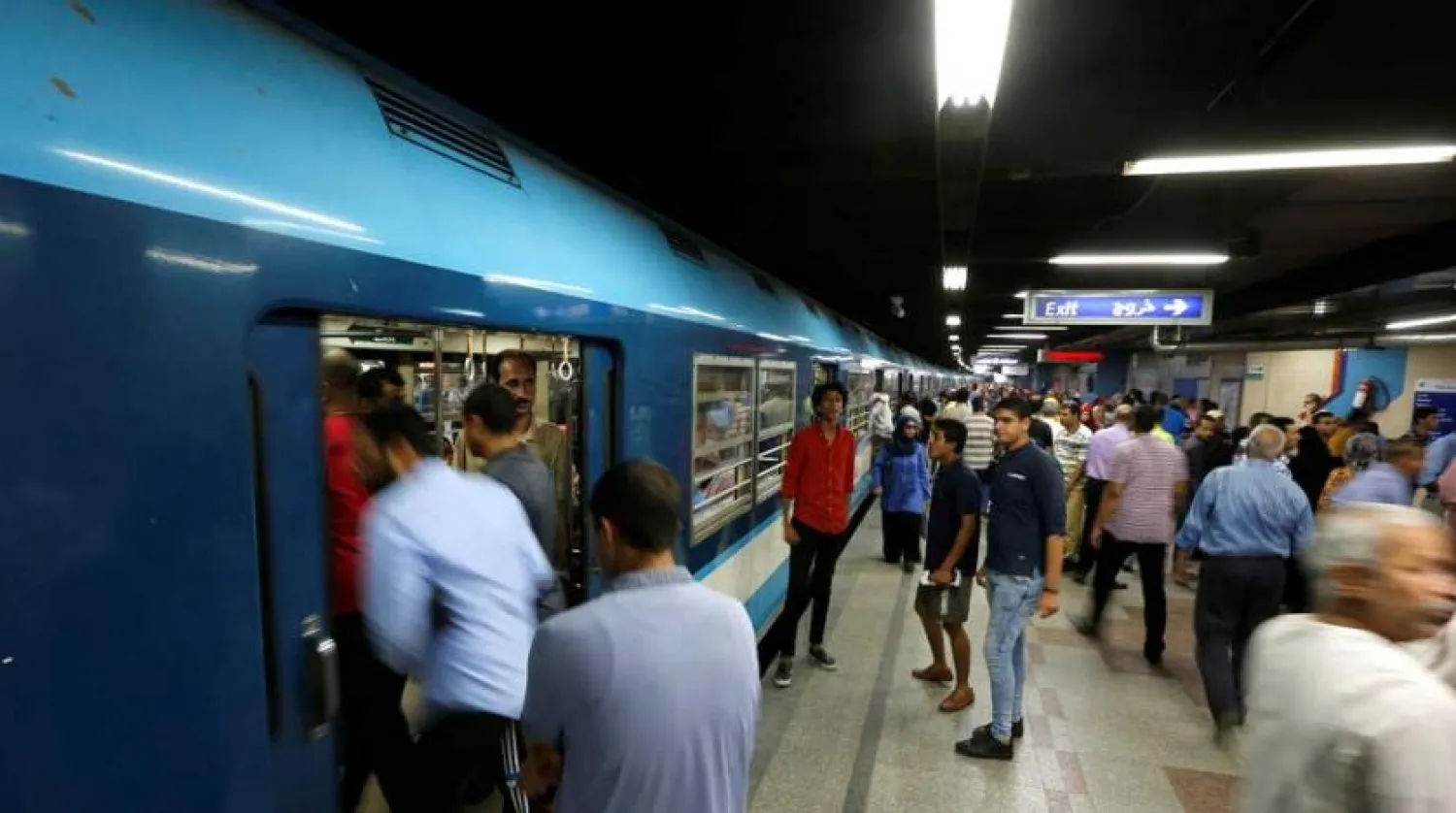 People wait to board a train at Al Shohadaa metro station in Cairo, Egypt, July 24, 2017. (Reuters)
