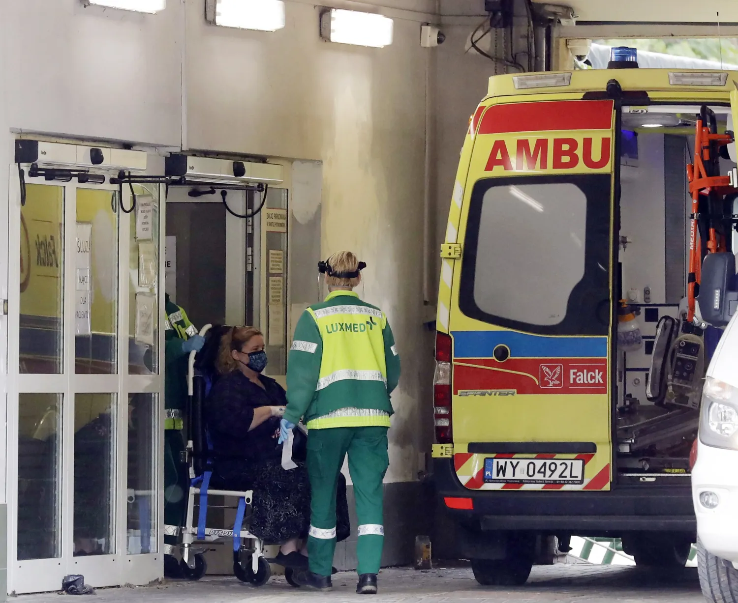 An ambulance brings a COVID-19 patient to a specialized hospital in Warsaw, Poland, Tuesday, Oct. 20, 2020. (AP Photo/Czarek Sokolowski)