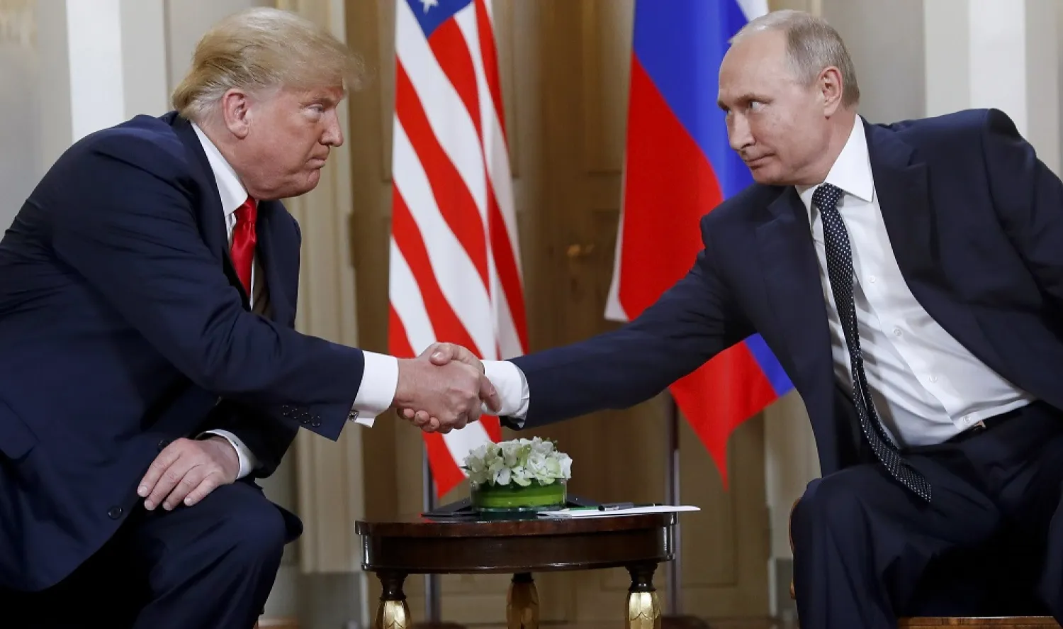 In this July 16, 2018, file photo, then US President Donald Trump, left, and Russian President Vladimir Putin meet at the Presidential Palace in Helsinki, Finland. (AP)
