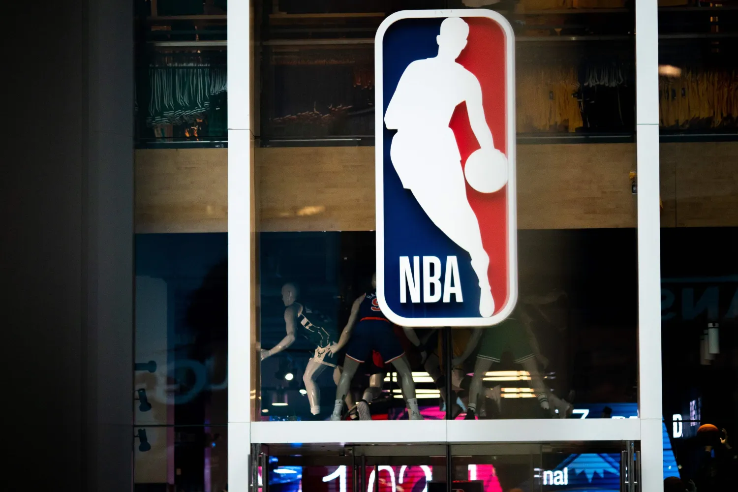 An NBA logo is shown at the Fifth Avenue NBA store in New York City, New York, US, March 12, 2020. (Getty Images North America / AFP)
