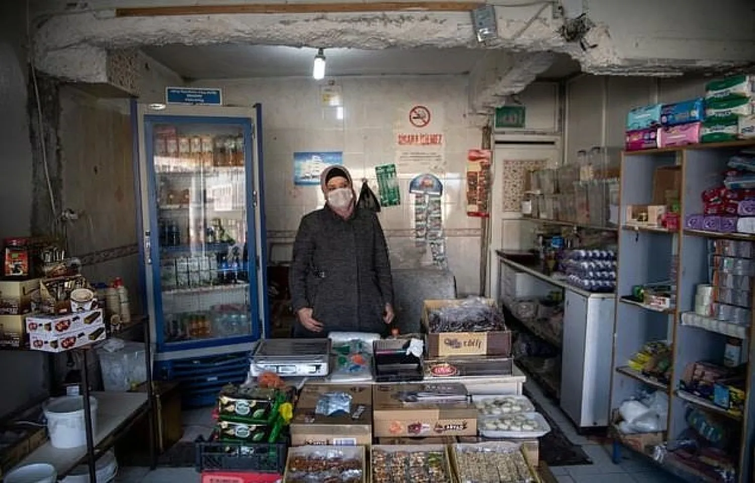 "How could I go back there?" asks Syrian grocer Ahd Al-Wali, 39, who fled Aleppo with her son - AFP