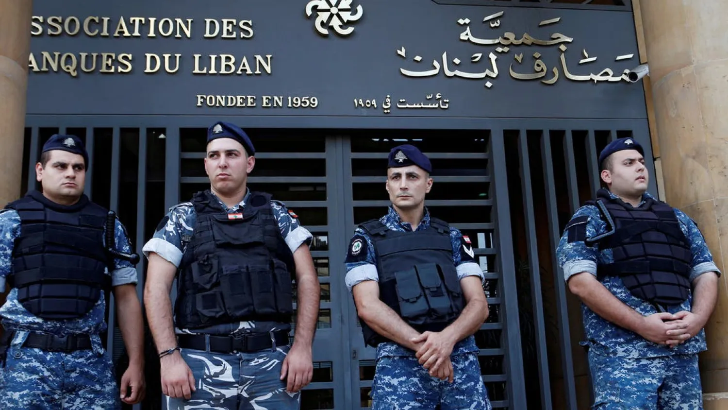 Lebanese police stand outside the entrance of the Association of Banks in downtown Beirut, Lebanon on November 1, 2019. (Reuters)
