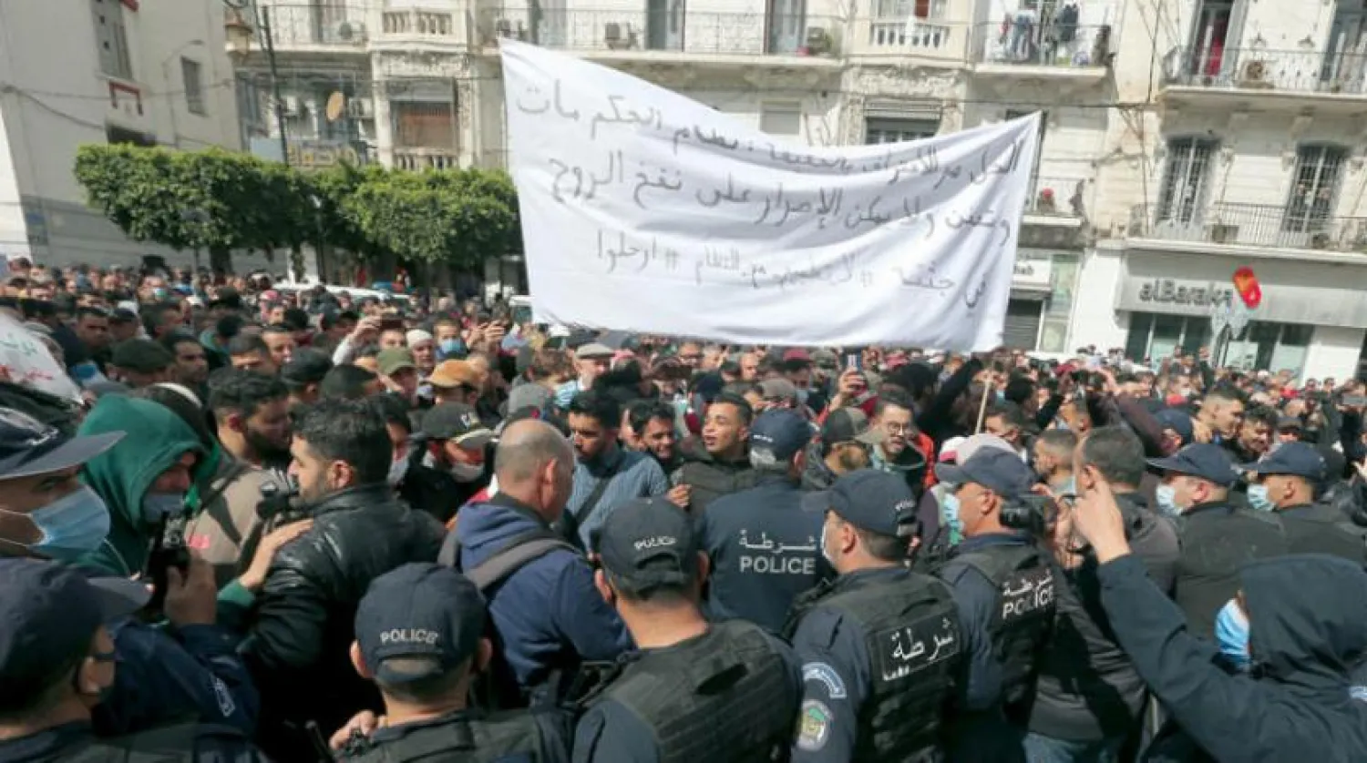 Students face police forces during a demonstration in Algiers, Tuesday, March 9, 2021. (AP Photo/Anis Belghoul)
