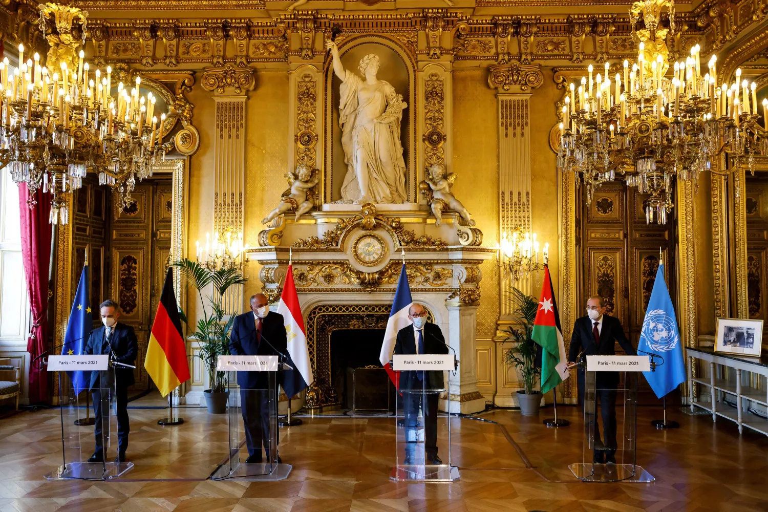 From left to right, German Foreign Minister Heiko Maas, Egyptian Foreign Minister Sameh Shoukry, French Foreign Affairs Minister Jean-Yves Le Drian and Jordanian Foreign Minister Ayman Safadi speak to the media during a press conference in Paris, Thursday, March 11, 2021. (Ludovic Marin/Pool Photo via AP)