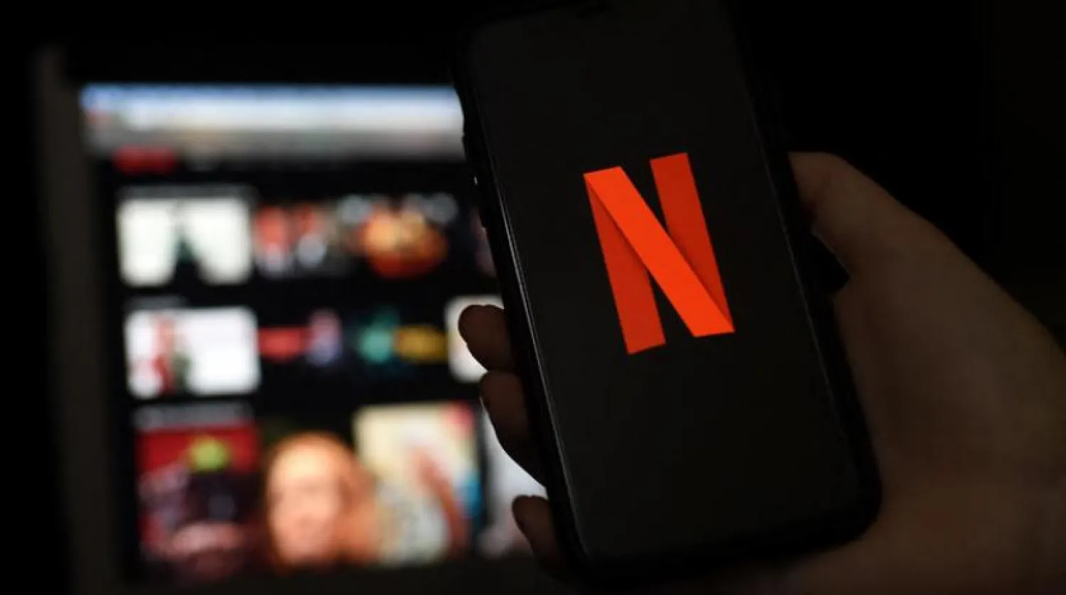 Bir cep telefonunun ekranındaki Netflix logosu  (AFP) 