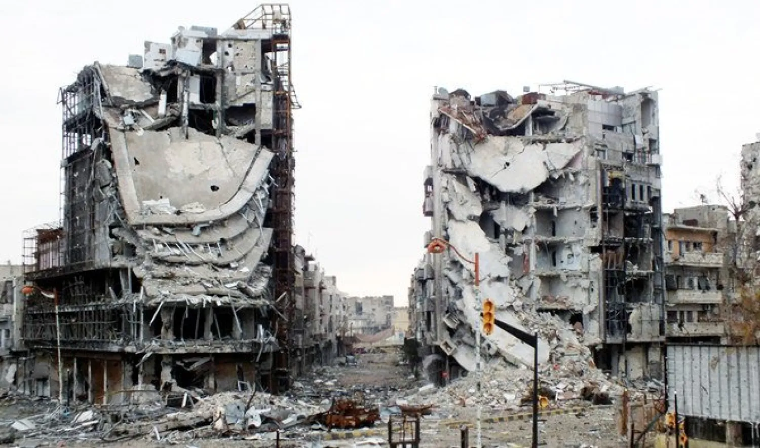 Destroyed buildings are seen on a deserted street in Homs, Syria January 30, 2013. (REUTERS)
