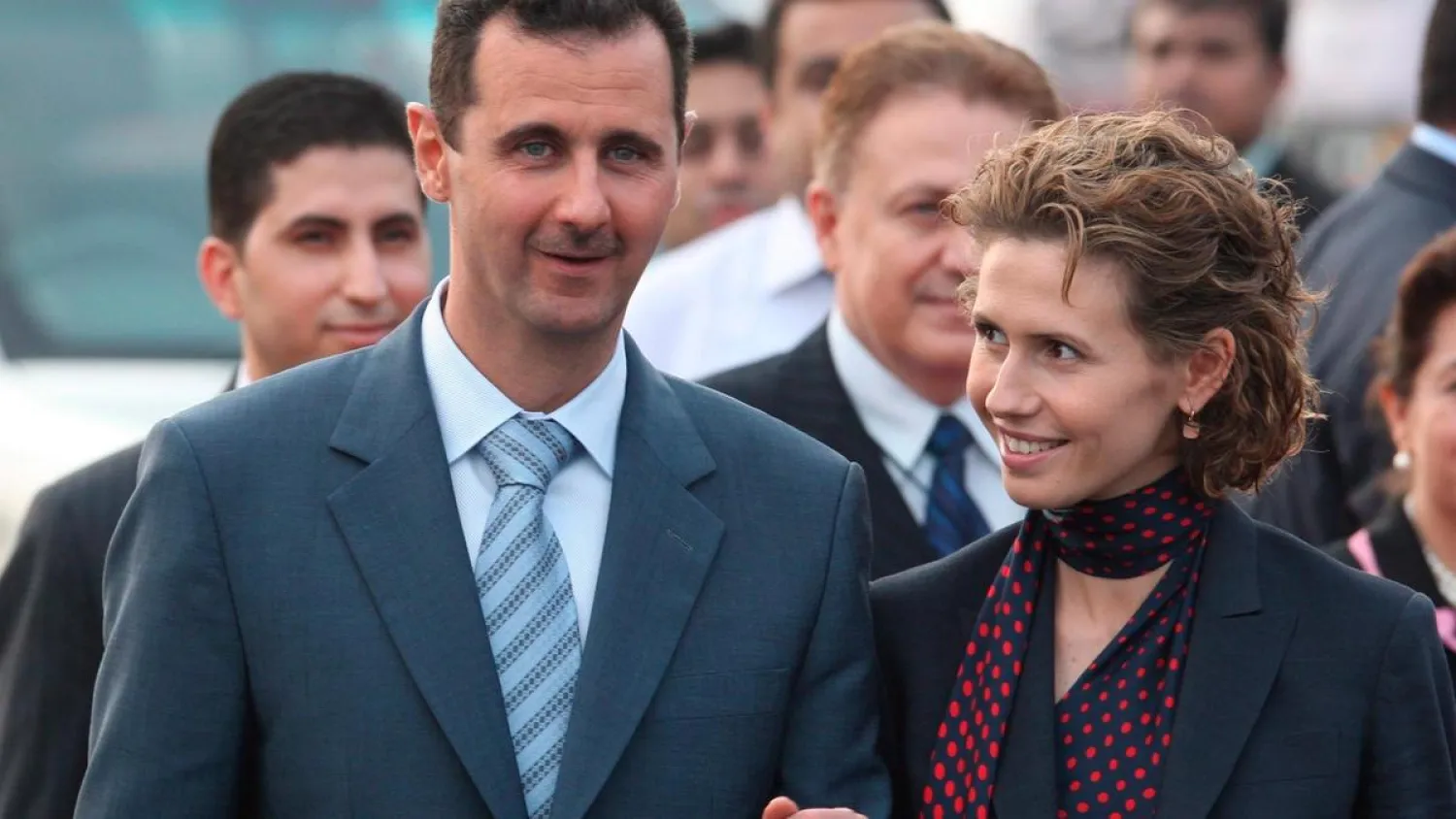  Asma Assad, pictured with her husband, Syria's President Bashar Assad, is being investigated by British police over involvement in war crimes. EPA
