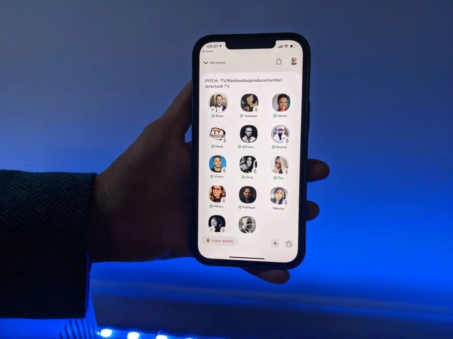 A user of the social media app Clubhouse shows her smartphone with the logo of the audio application. Photo: Christoph Dernbach/dpa via Getty Images