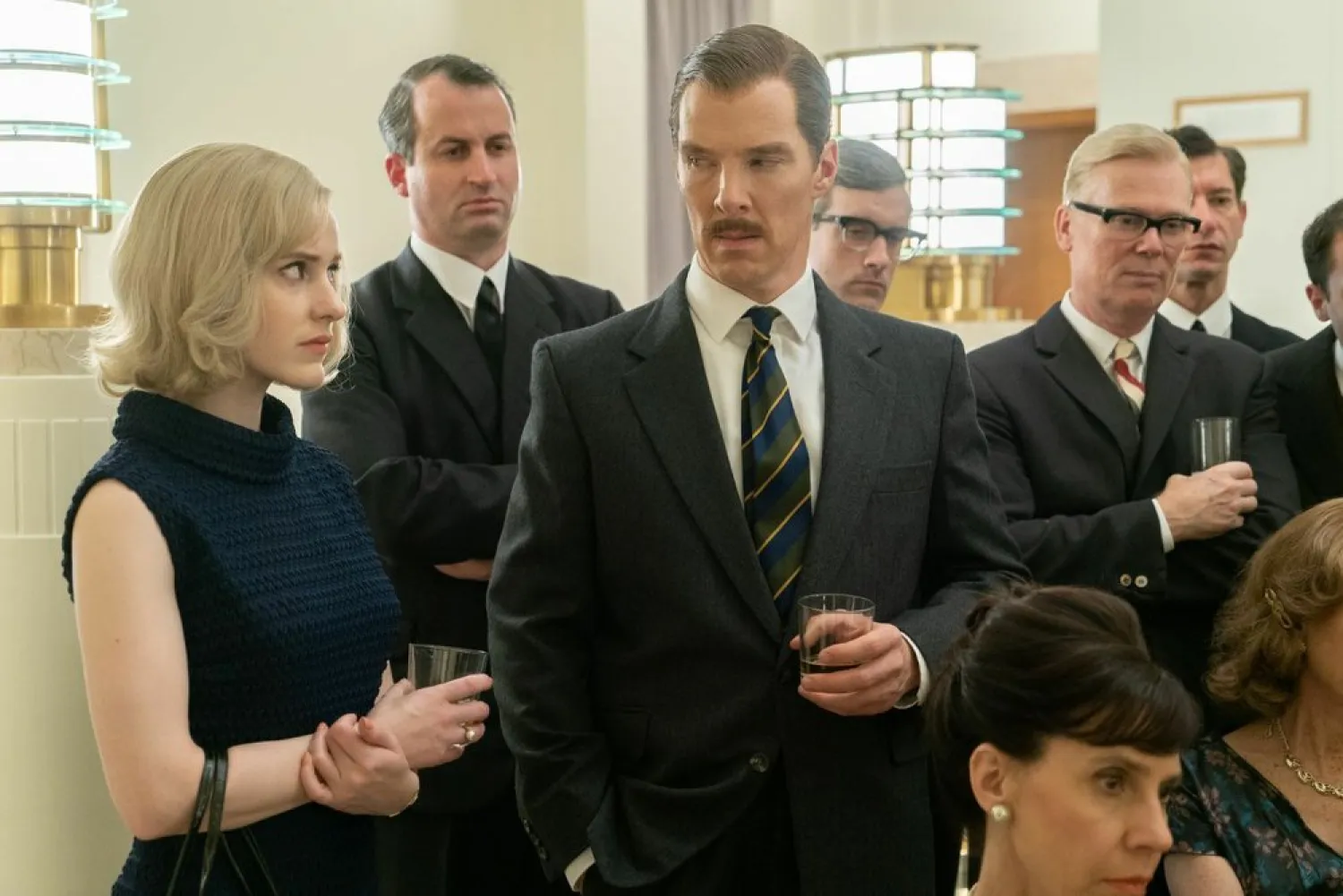 This image released by Roadside Attractions shows Rachel Brosnahan, left, and Benedict Cumberbatch, center, in a scene from "The Courier." (Roadside Attractions via AP)
