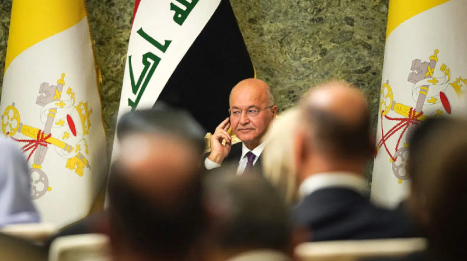 الرئيس العراقي برهم صالح أعلن أمس آلية لاسترداد «الأموال المنهوبة» من العراق (أ.ف.ب)