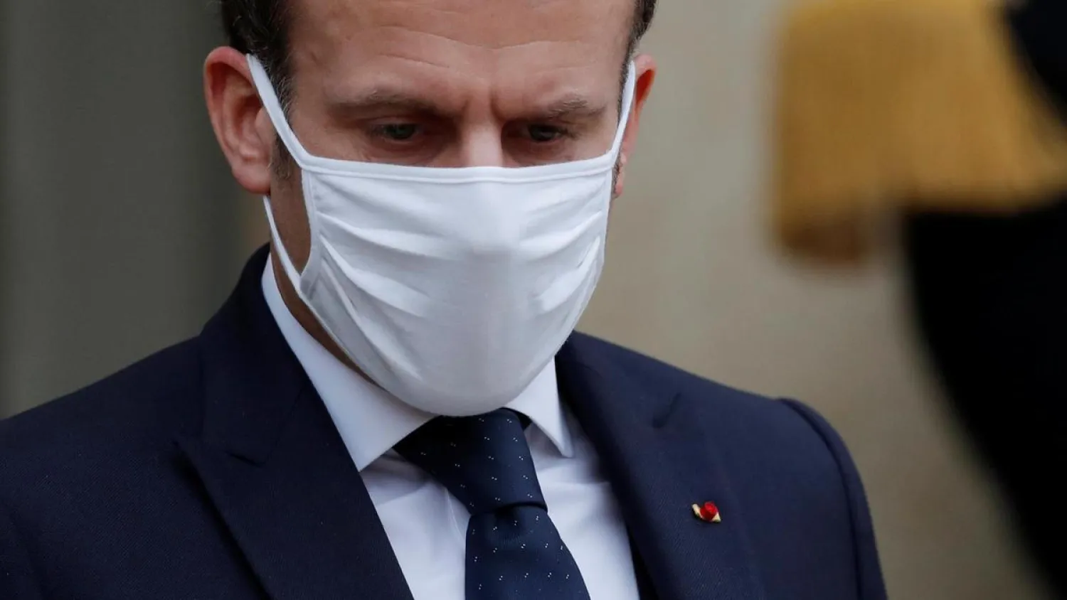 French President Emmanuel Macron, wearing a protective face mask. Reuters file photo