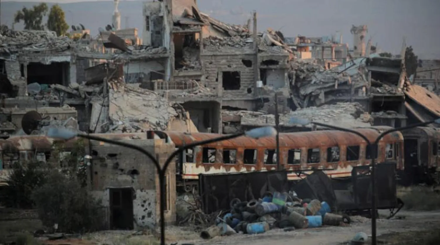 Destruction near a train station in the Syrian capital, Damascus, on September 12, 2018 (Reuters) 

