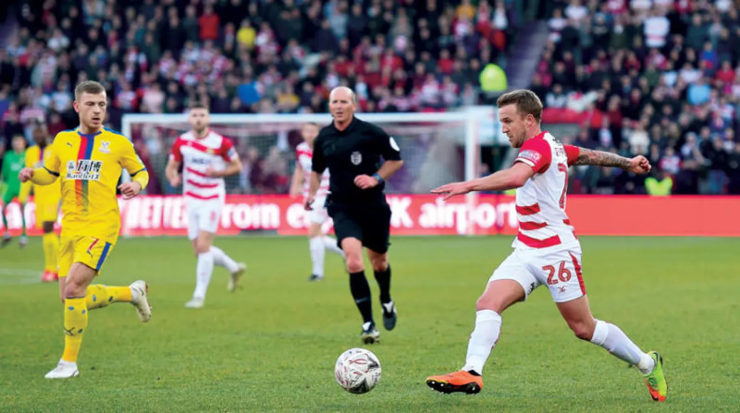 كوبنغر (يمين) شارك مؤخراً في المباراة رقم 800 في مسيرته الكروية (غيتي)