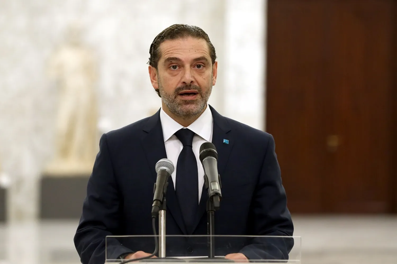 PM-designate Hariri speaks to the media after meeting Aoun at the presidential palace. (Dalati & Nohra)