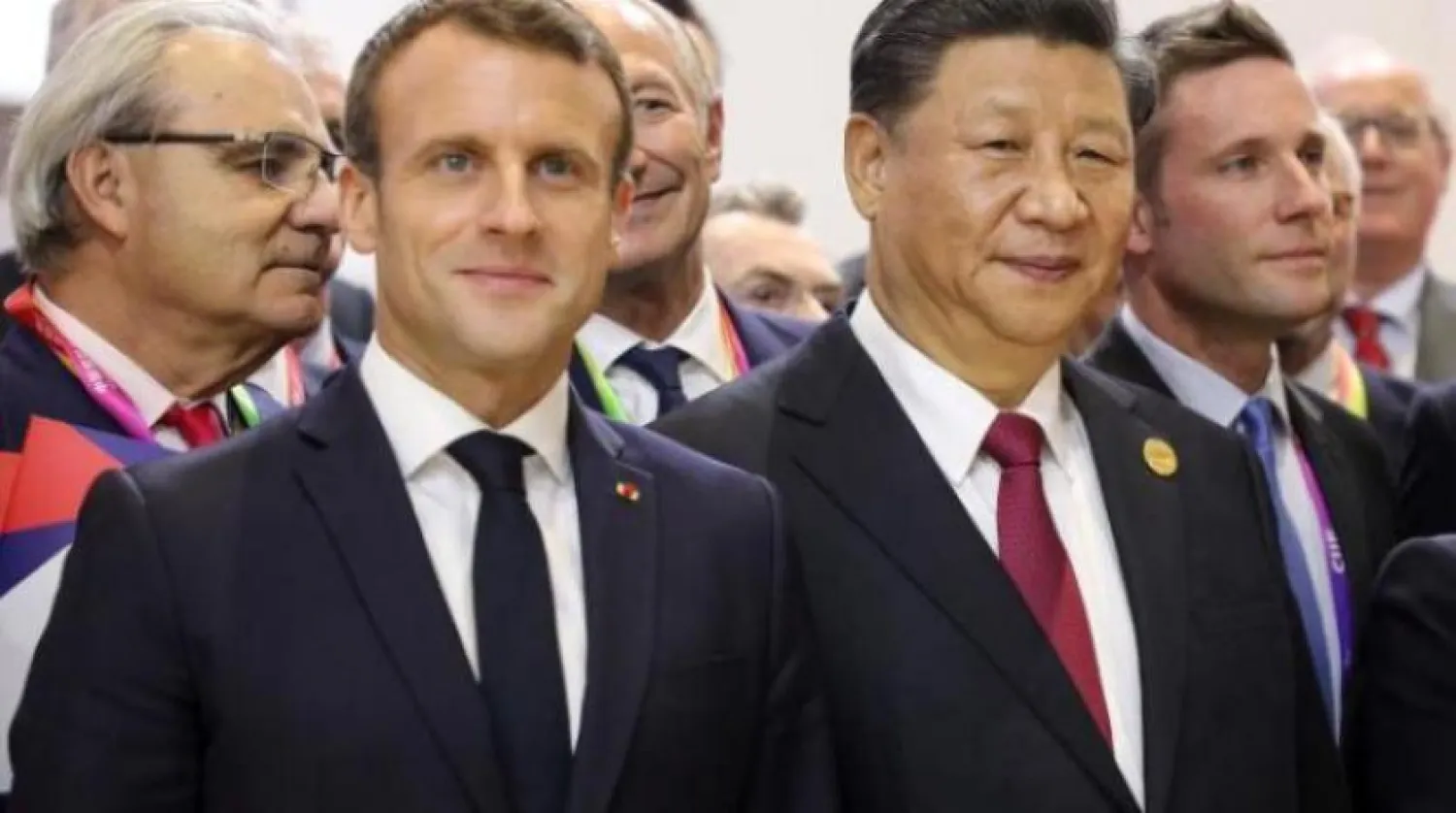 Çin Devlet Başkanı Şi Cinping ve Fransız mevkidaşı Emmanuel Macron (AFP)