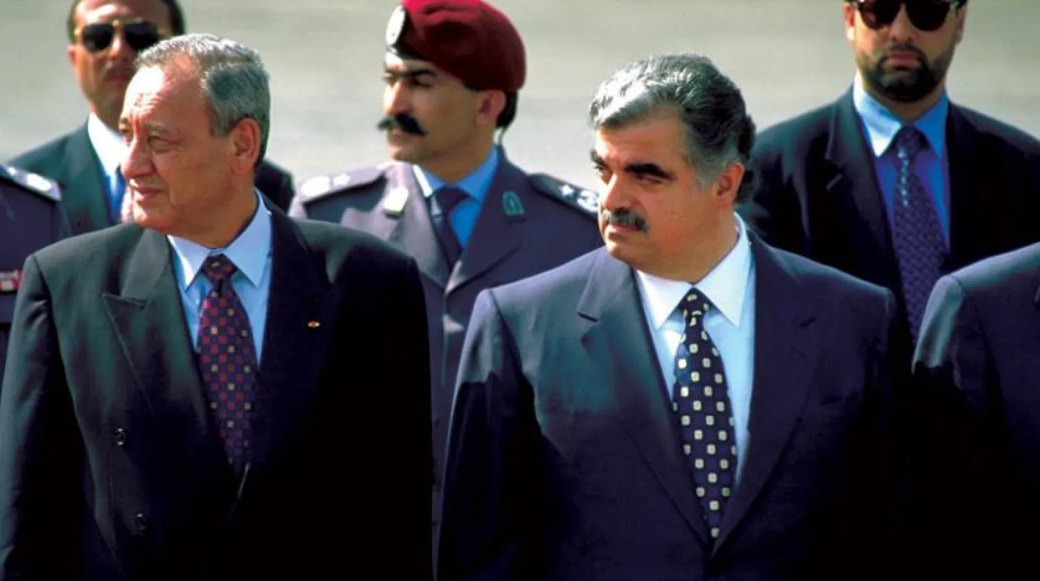 Lebanese former PM Rafik Hariri (R) and Speaker Nabih Berri in 1996. (Getty Images)
