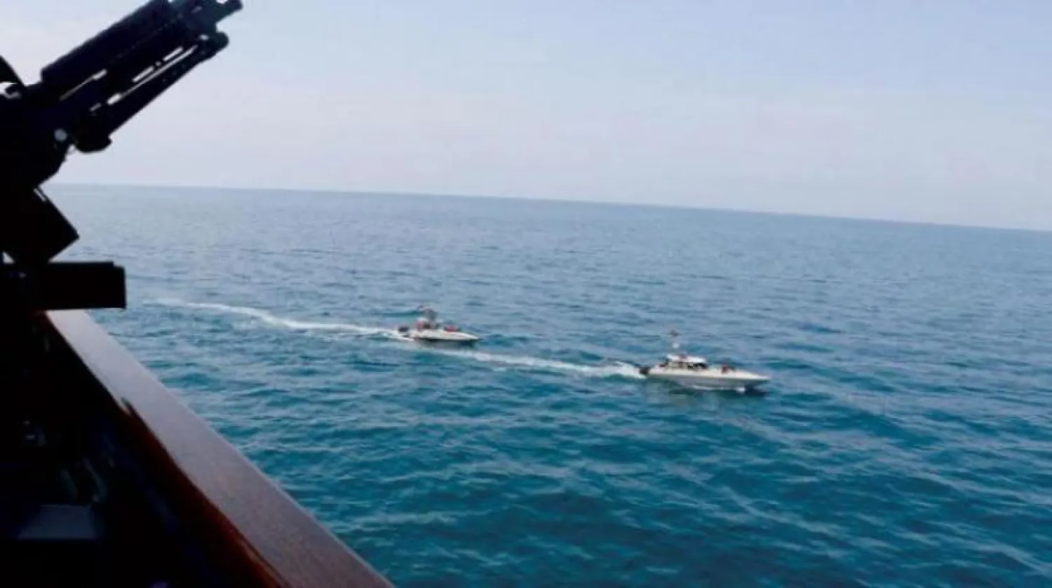 I ranianRevolutionary Guard Corps Navy vessels near US Military ships. EPA