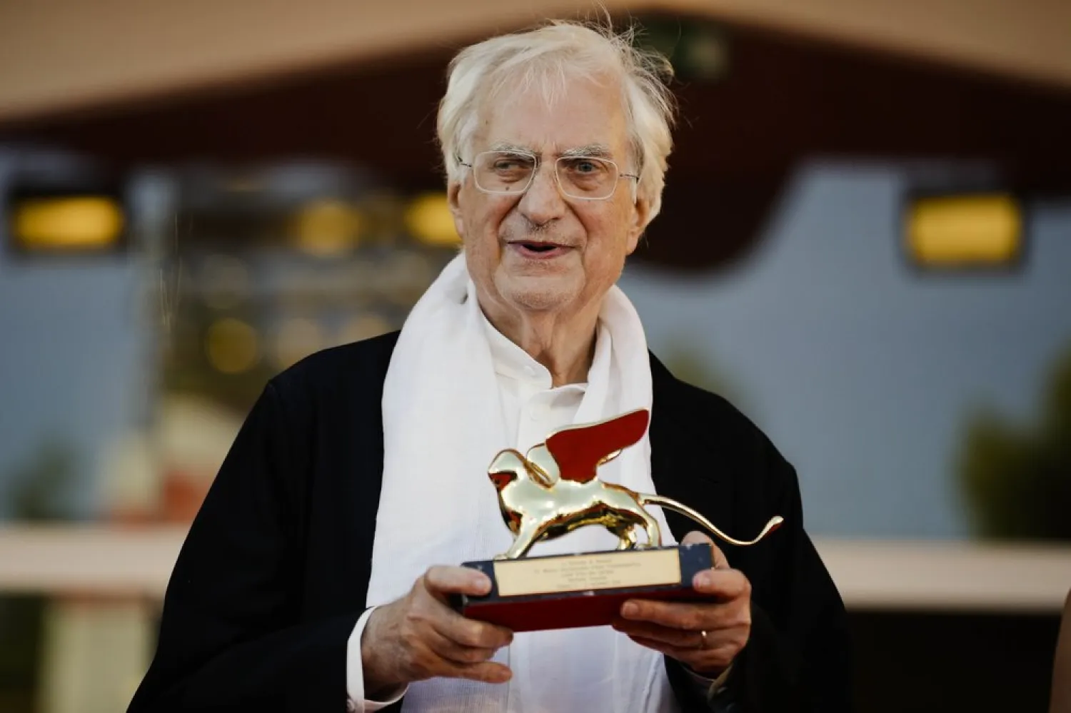 In this Sept. 8, 2015 photo, Bertrand Tavernier poses with his Golden Lion for Lifetime Achievements after the award ceremony at the 72nd edition of the Venice Film Festival in Venice, Italy. (AP)