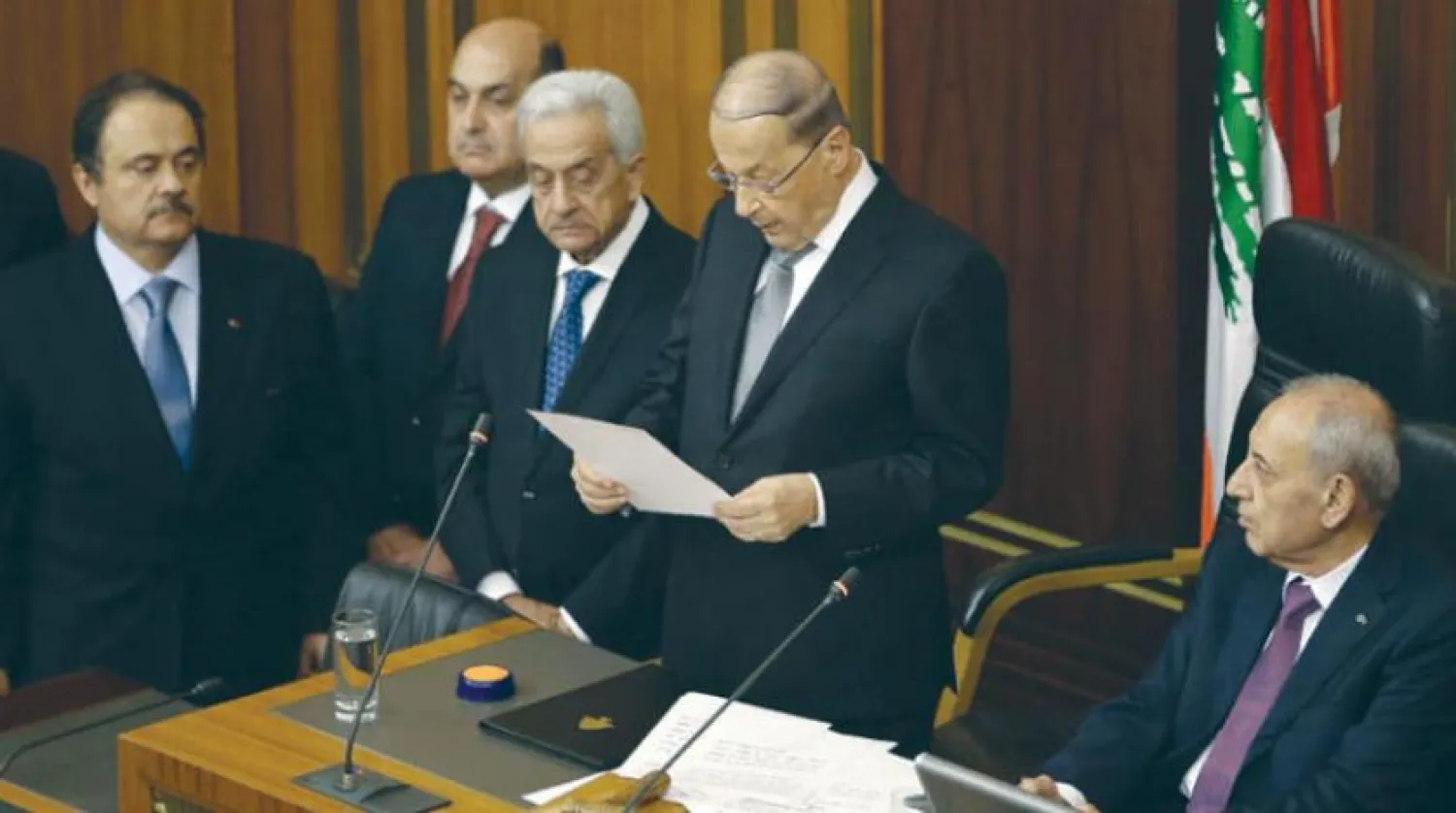Michel Aoun is sworn in as president as Speaker Nabih Berri (right) looks on. (AFP)