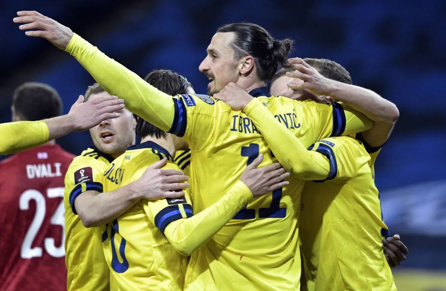 Sweden's Zlatan Ibrahimovic, center, celebrates scoring his side's first goal during World Cup qualifier game between Sweden and Georgia at Friends Arena in Stockholm, March 25, 2021. (AP)