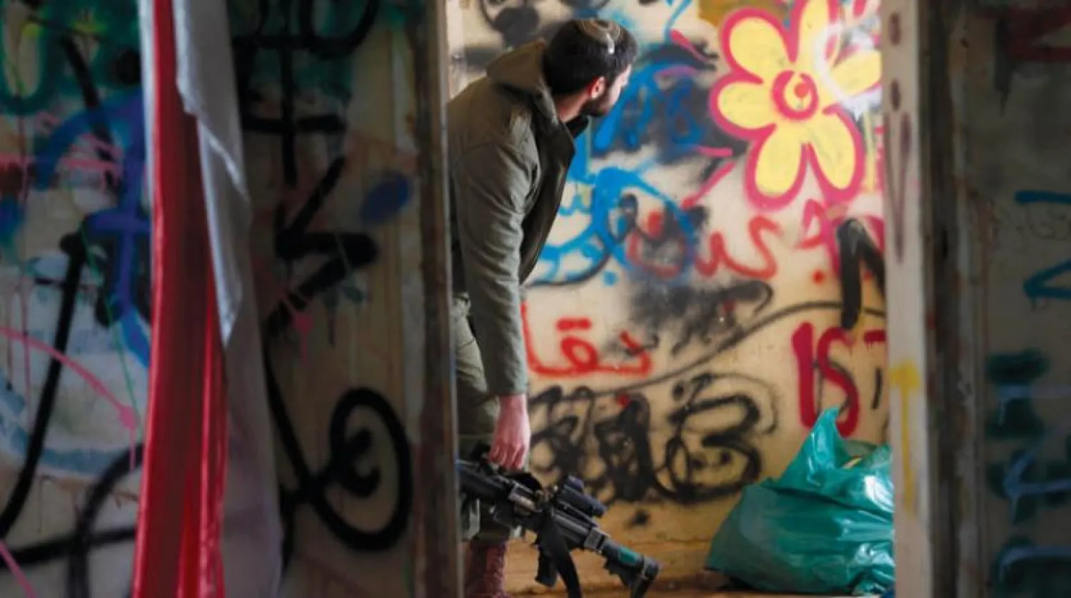 İşgal altındaki Suriye'ye ait Golan Tepeleri’nde geçtiğimiz ay askeri eğitim alan bir İsrail askeri (EPA)