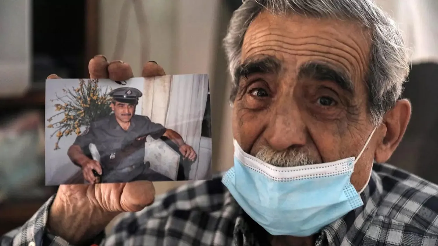 Jean Assaf, an 80-year-old retired Lebanese policeman, earns a monthly pension worth around $180 down from $1,400 before the economic crisis. (AFP)