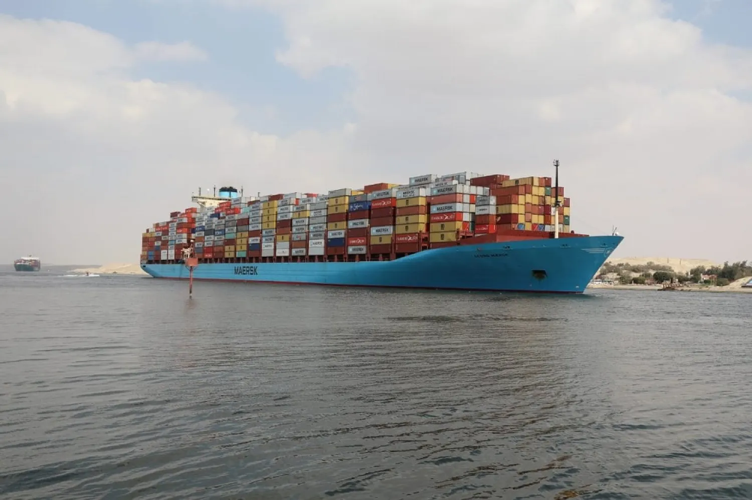 A container ship sails at the Suez Canal, in Ismailia, Egypt March 31, 2021. (Handout via Reuters)