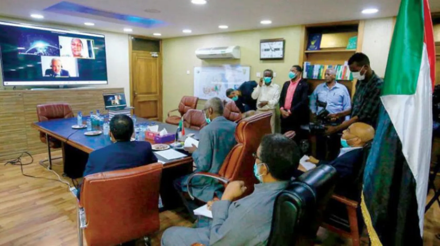  The Sudanese Minister of Irrigation during virtual talks with his Egyptian and Ethiopian counterparts in June 2020. (AFP) 