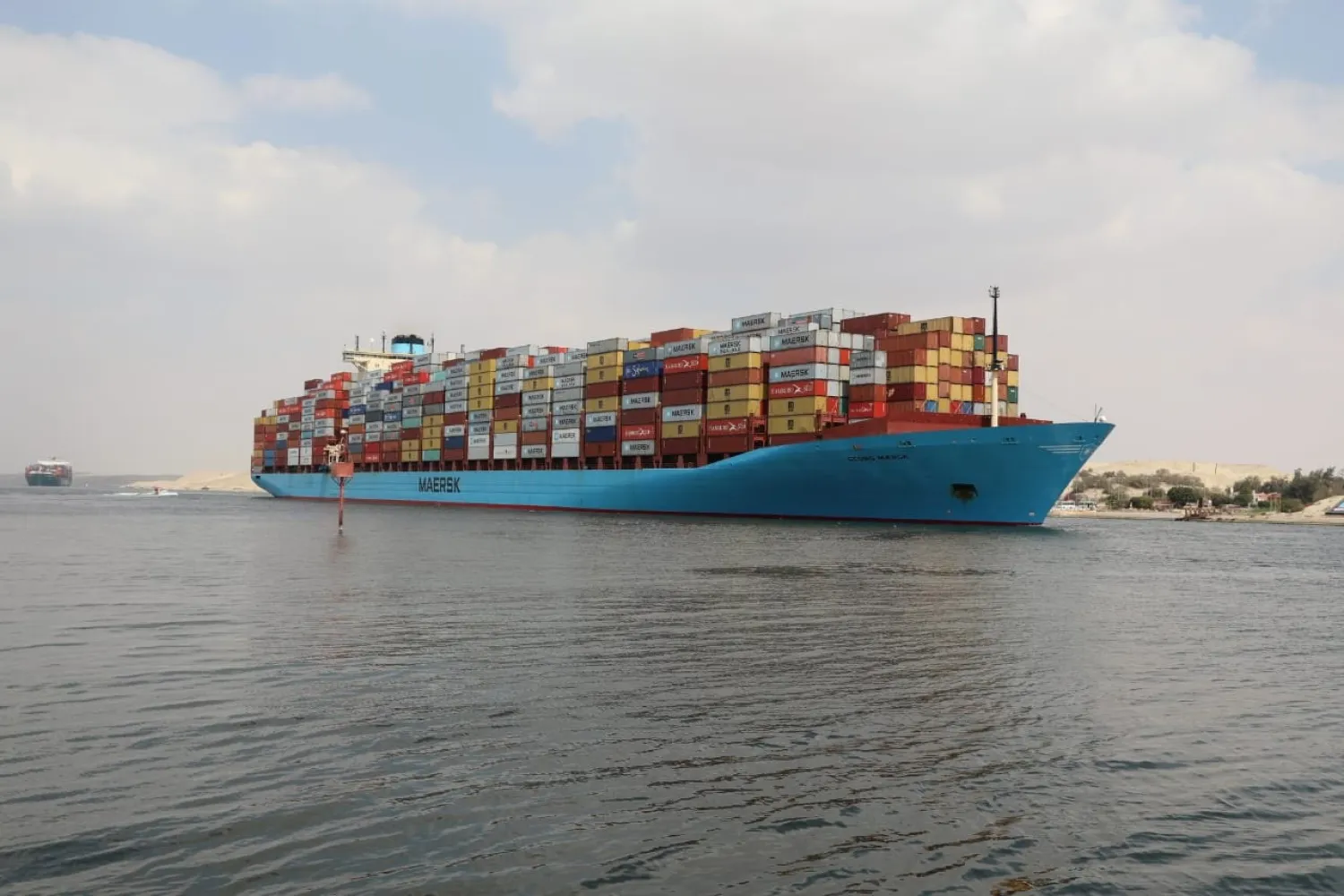 A container ship sails at the Suez Canal, in Ismailia, Egypt March 31, 2021. Suez Canal Authority/Handout via REUTERS