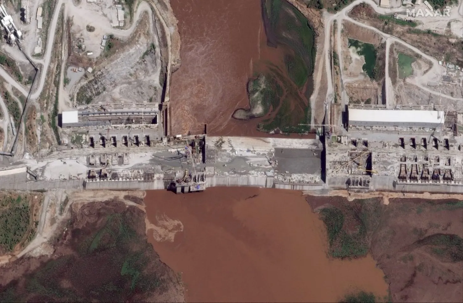 This satellite image taken Thursday, May 28, 2020, shows the Grand Ethiopian Renaissance Dam on the Blue Nile river in the Benishangul-Gumuz region of Ethiopia. (Maxar Technologies via AP)