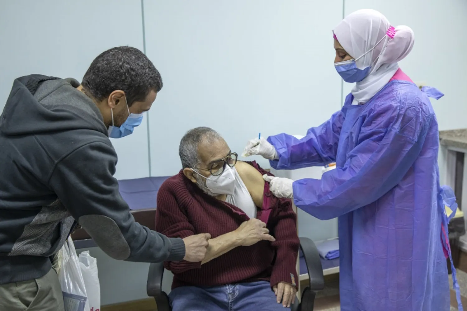 A man receives the COVID-19 vaccine in Cairo. (AP)