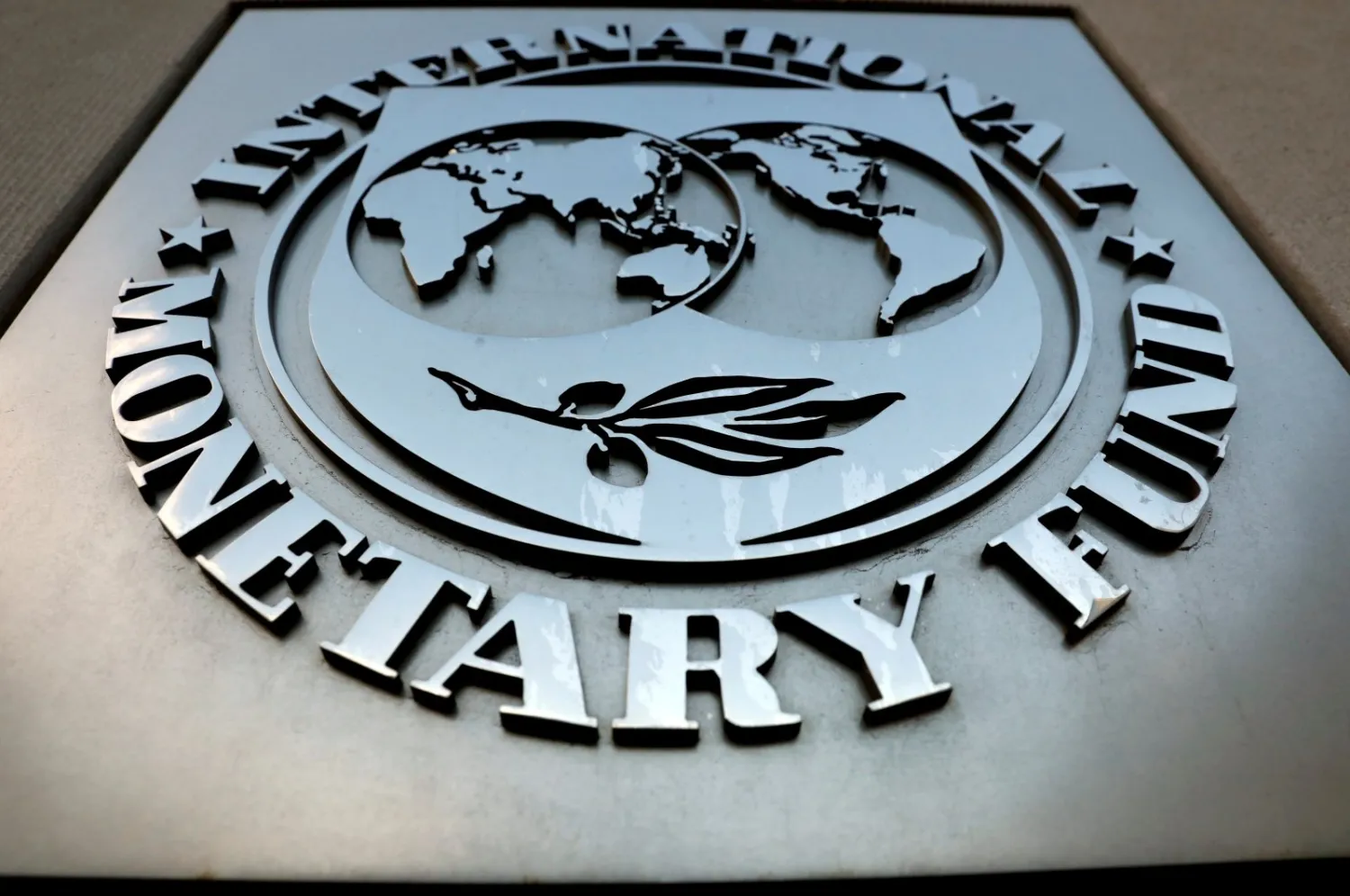  The International Monetary Fund (IMF) logo is seen outside the headquarters building in Washington, US. REUTERS/Yuri Gripas
