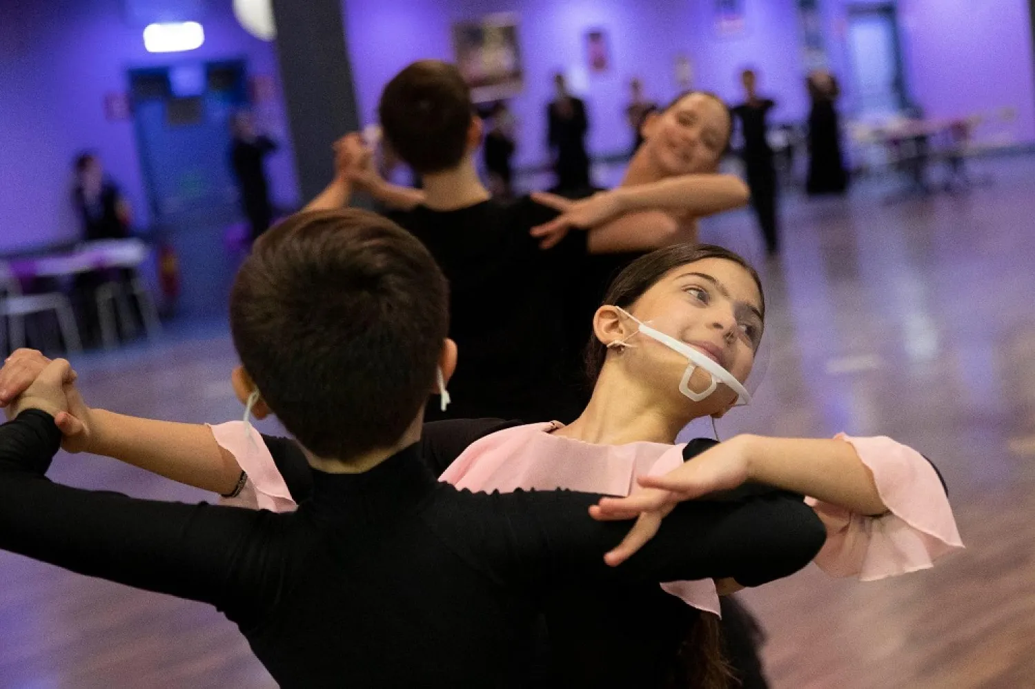 Young dancers, wearing face masks to curb the spread of COVID-19 train at the New Dancing Days school, in Rome, Wednesday March 24, 2021. (AP)