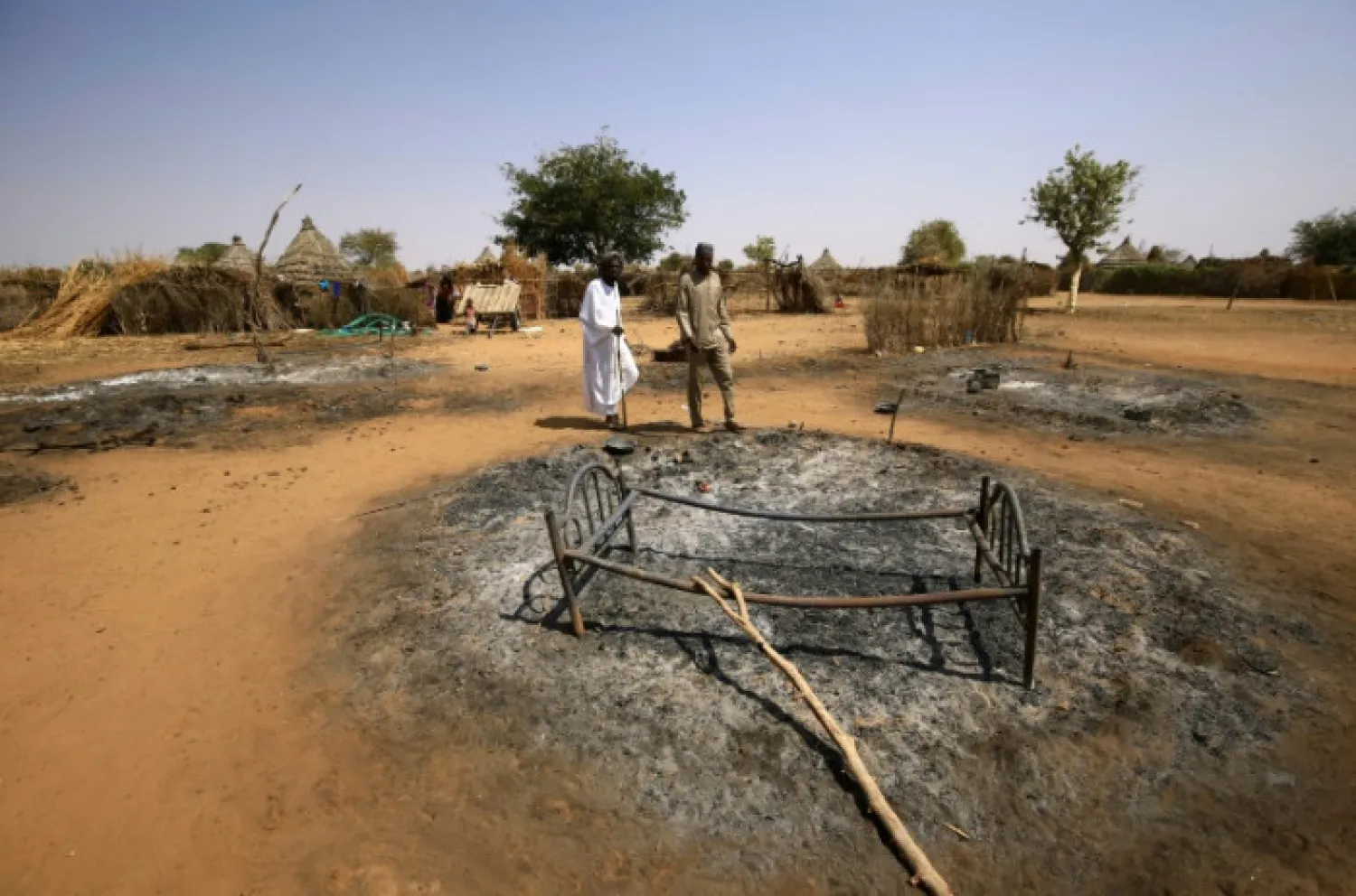 Sudan's Darfur has suffered years of conflict; this photograph from February 2 shows the ruins of a home set on fire in fighting - AFP