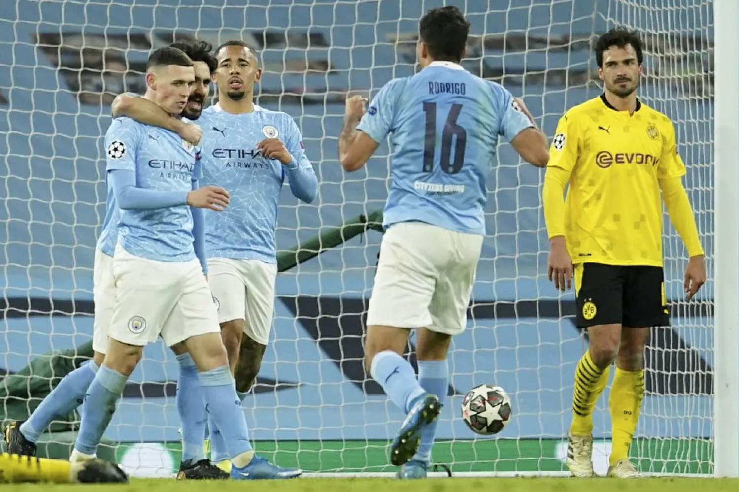 Manchester City's Phil Foden celebrates after scoring his side's second goal against Borussia Dortmund at the Etihad stadium in Manchester, Tuesday, April 6, 2021. (AP)