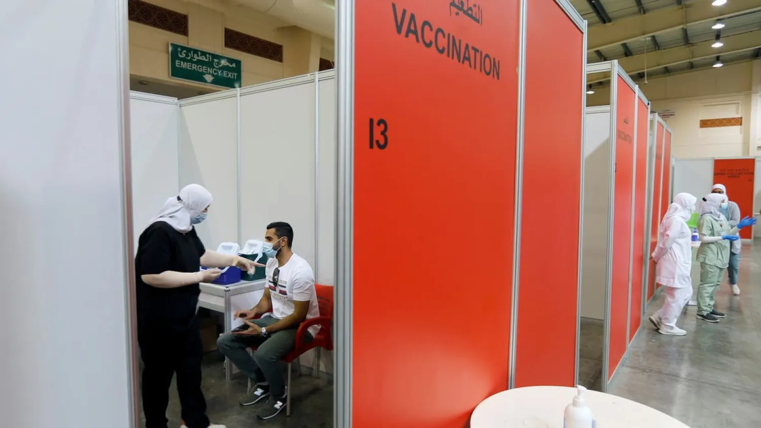 A Bahraini man waits to get a dose of a coronavirus vaccine in Manama. Reuters file photo
