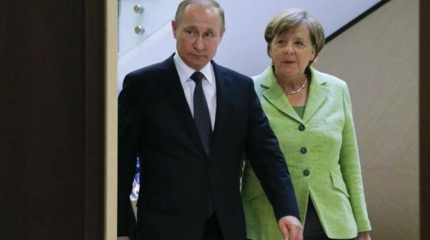 Rusya Devlet Başkanı Vladimir Putin ve Almanya Başbakanı Angela Merkel (Arşiv - Reuters)