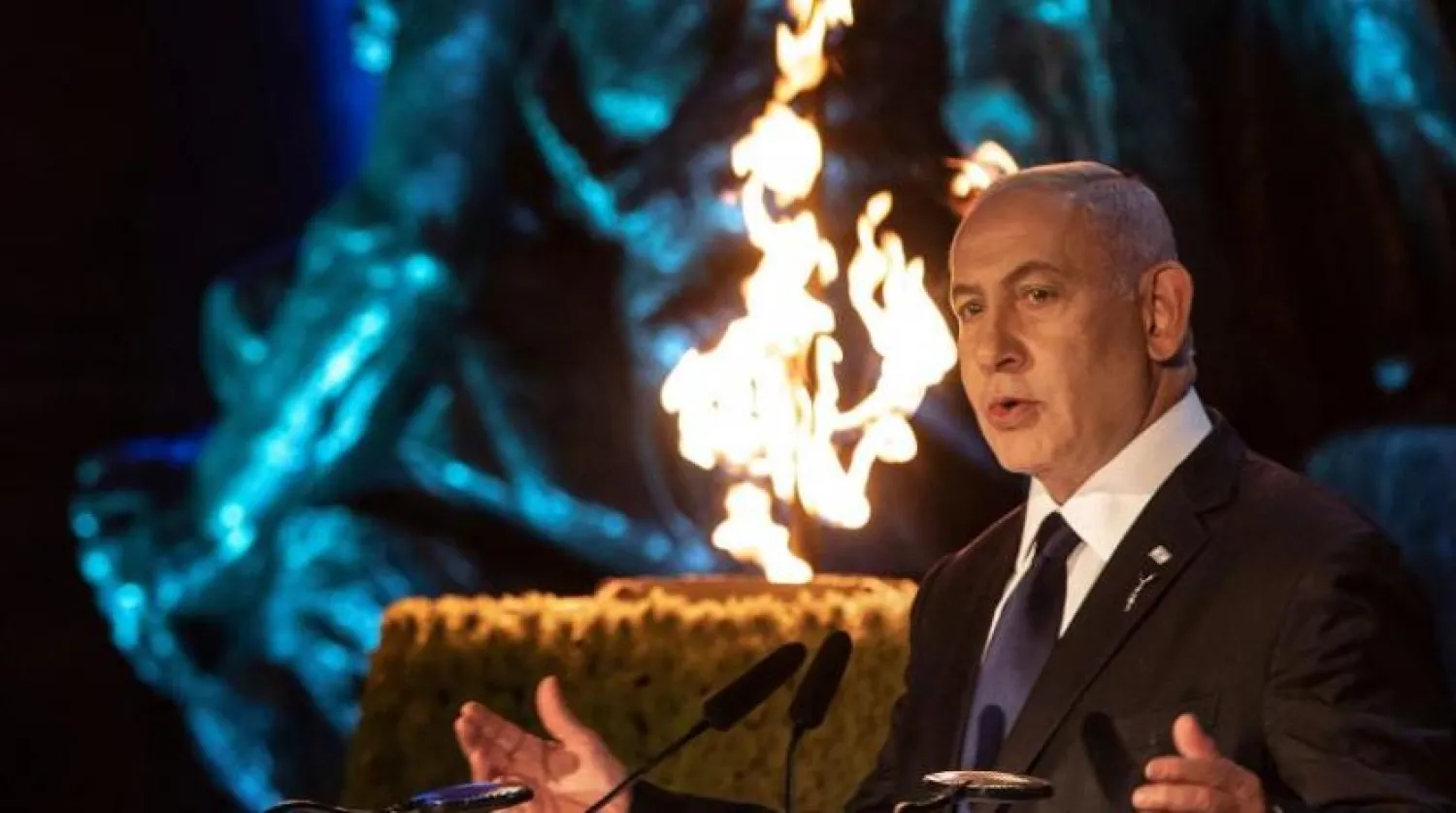 Israeli Prime Minister Benjamin Netanyahu delivers a speech at the Holocaust Martyrs' and Heroes Remembrance Day ceremony, at the Yad Vashem memorial in Jerusalem on April 7, 2021. (Photo by Heidi levine / POOL / AFP)