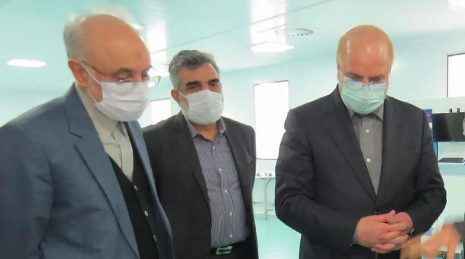 İran Meclis Başkanı Muhammed Bakır Kalibaf, İran Atom Enerjisi Kurumu Başkanı Ali Ekber Salihi ve Kurumun Sözcüsü Behruz Kemalvendi geçtiğimiz Ocak ayında Fordo Nükleer Tesisi'nde incelemelerde bulunurken (AFP)