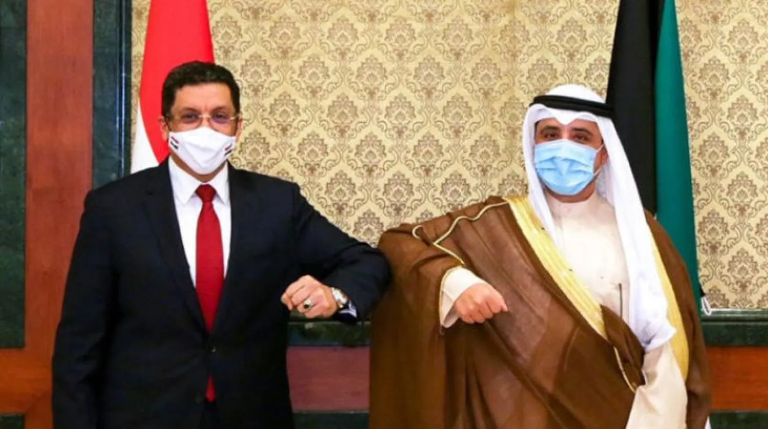 Taiwanese Foreign Minister Joseph Wu, right, speaks during a briefing on April 7, 2021, in Taipei. (AP Photo/Wu Taijing)
