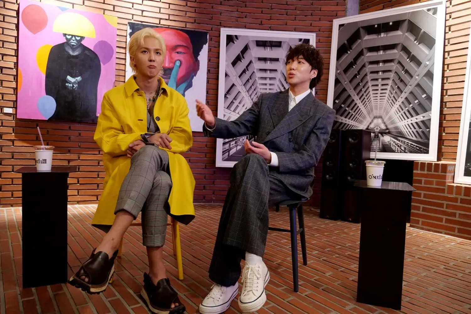 MINO and KANG SEUNG YOON attend an interview with Reuters at a cafe in Seoul, South Korea March 31, 2021. (Reuters)
