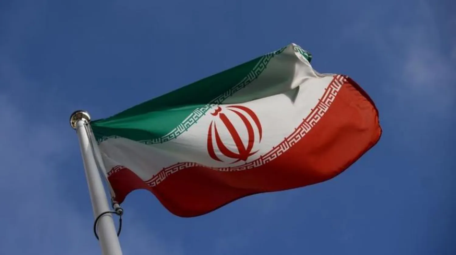 The Iranian flag waves in front of the IAEA headquarters, before the beginning of a board of governors meeting, amid the coronavirus disease (COVID-19) outbreak in Vienna, Austria, March 1, 2021. (Reuters)
