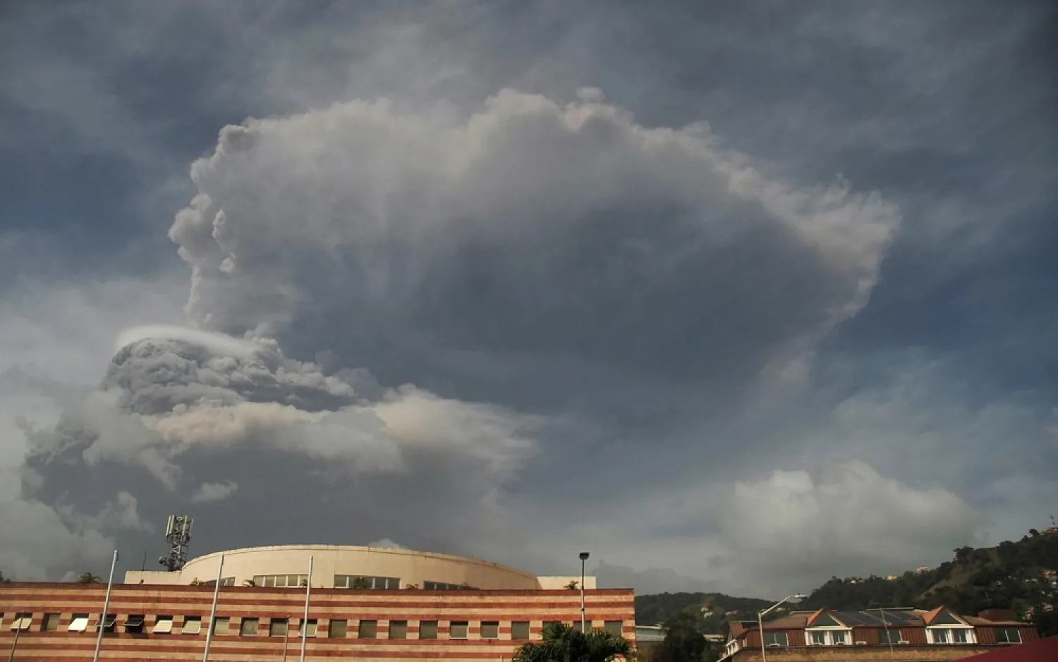 Ash and smoke billow as the La Soufriere volcano erupts in Kingstown on the eastern Caribbean island of St. Vincent, April 9, 2021. (Reuters)