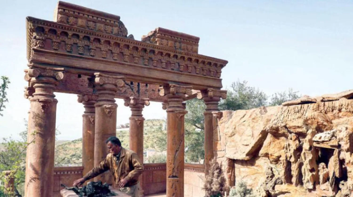 A displaced Syrian from Aleppo visiting an archaeological site (AFP) 

