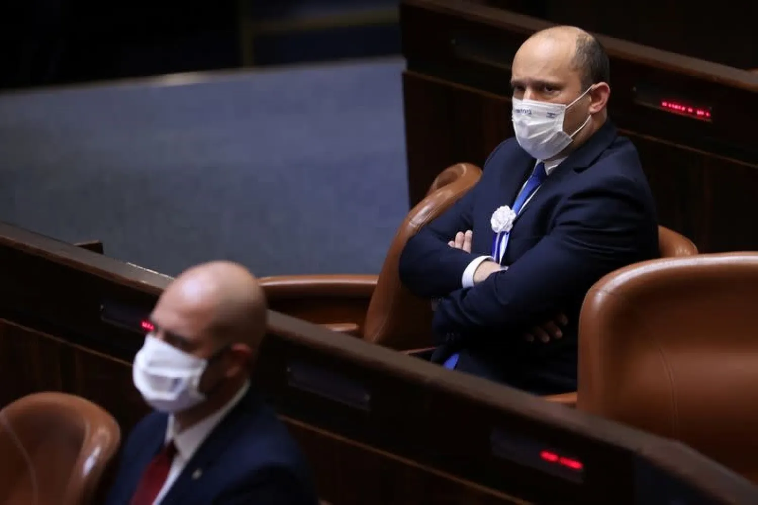 Naftali Bennett, head of the Yamina party sits in the Plenum during the swearing-in ceremony, at the Knesset, the Israeli Parliament, in Jerusalem April 6, 2021. (Reuters)