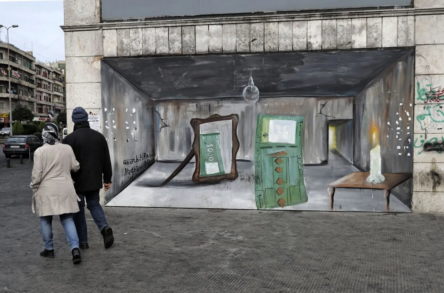 A couple walks past a graffiti mural depicting a 100,000 Lebanese banknote being reflected in a mirror as a 1,000 Lebanese banknote, symbolizing the level of inflation caused by the collapsing economy, at Lebanon’s al-Nour square, on Jan. 26. (Getty Images)